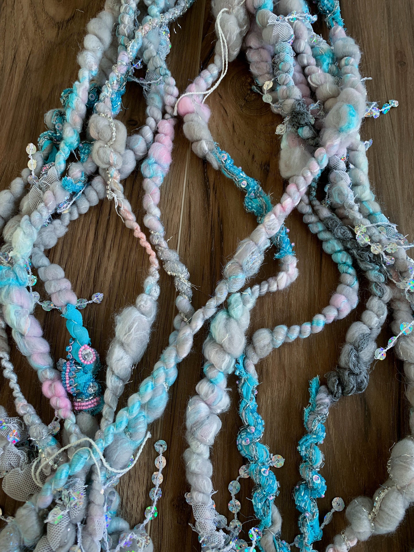 Antique Button and Fabric Scrap Handspun Art Yarn in Grey, Blue, and Pink